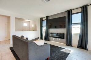 Living Room | Smart TV | Electric Fireplace | Central A/C