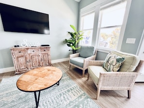 Your relaxation headquarters: A comfy living room with a view.