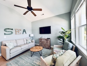 Unwind and get cozy in the heart of your home: the perfect living room.