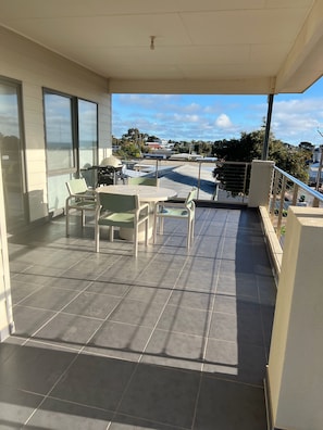 upstairs balcony, with med Webber
An extra 6 plastic chairs are avail.