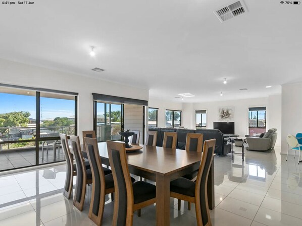 HUGE dining, lounge & kitchen area upstairs