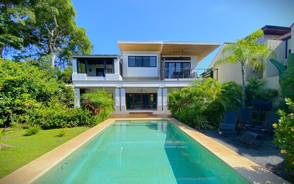 View from the end of the pool of the private back yard and patios!  