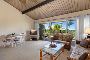 Cozy and spacious living area with TV