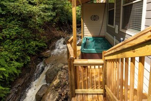 Hot Tub with a Waterfall View