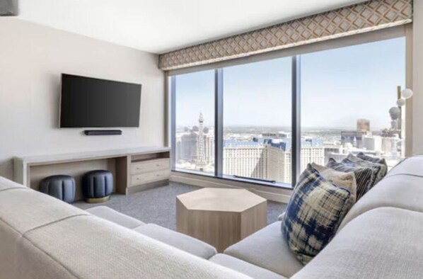 Lounge with stunning views. Sofa converts into sofa bed.