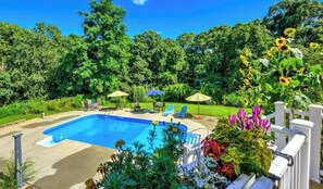 26,000 gallon pool ranges from 3-8 feet in depth