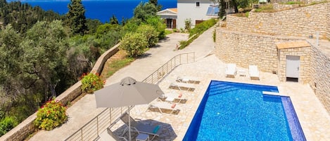 Beautiful villa with private pool, terraces, and garden with panoramic sea views