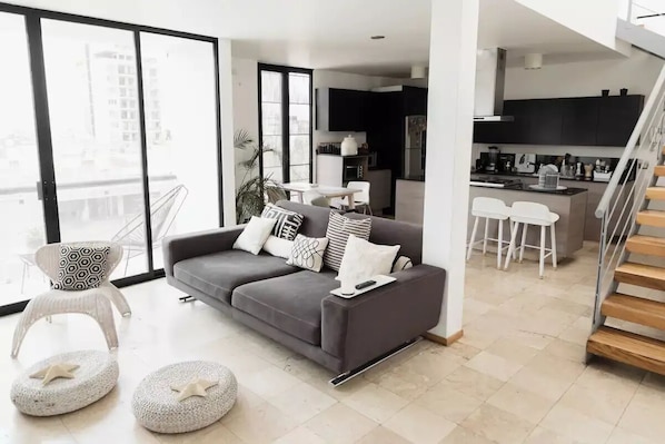 Penthouse living room kitchen balcony