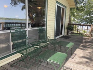 Two additional chairs with matching footstools and small table 
