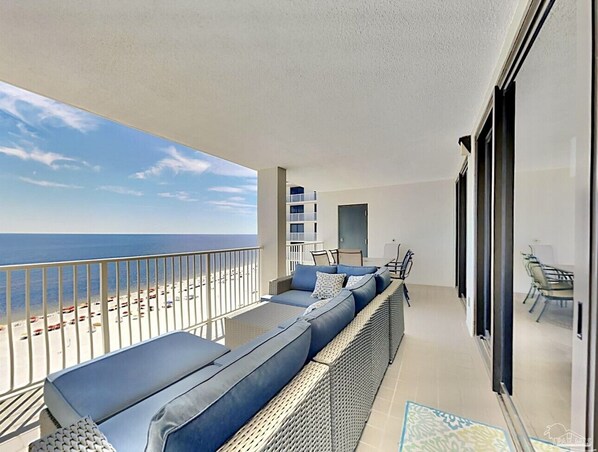 Ocean View Balcony with Comfortable Lounge couch and Dinning table