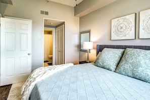 Master bedroom - serene comfort in king-size bed, ensuite bath.