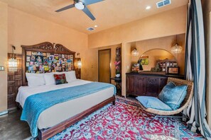 Rest and relax in this cool king size bed with a cool comfy chair.