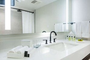Full bathroom with a shower. Basic toiletries and towels are provided