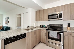 Knock up a gourmet meal with your  fully-equipped kitchen. The kitchen is stocked (200-piece culinary set) and has a full line of new appliances.