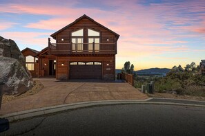 Amazing view and privacy on this 5,300 sqft, log style home in Castle Glen Estates.