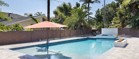 Private  Pool and Jaccuzi with Baja shelf, water fall and poolside fire pit, outdoor seating and bbq for grilling.