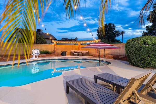 Beautiful pool deck w/ loungers, sitting area and fire pit.