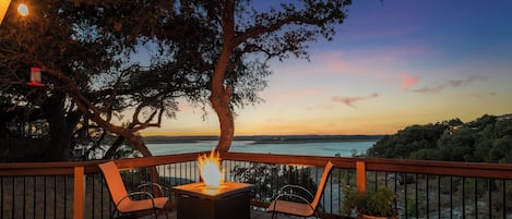 Enjoy a cozy fire with a picture perfect view of the lake