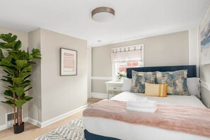 Soak up the summer calm! ☀️🌿 Bedroom 2 is your cozy oasis, featuring a comfy full bed and breezy soft textiles, perfect for unwinding after a sun-filled day. #SummerSerenity #CozyEscape

