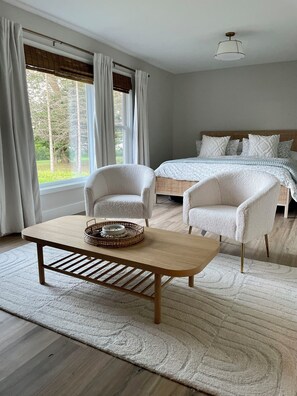Master bedroom, private sitting area with TV and an attached full bath 