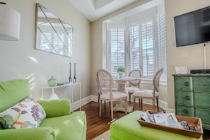 Dining area with bay window to private balcony