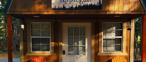 This cozy cabin, nestled among the towering pines and firs,  offers a rustic charm and a serene retreat from the hustle and bustle of everyday life. The place features a queen-sized bed with cozy blankets, Smart TV, a Keurig Coffee maker, Mini-fridge, a microwave, air conditioning, and heat. 