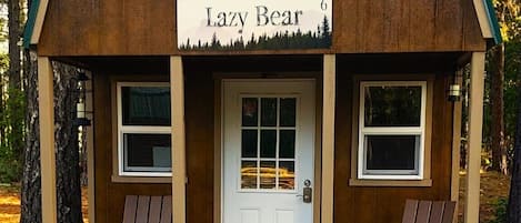 This cozy cabin, nestled among the towering pines and firs,  offers a rustic charm and a serene retreat from the hustle and bustle of everyday life. The place features a luxury king-sized bed with cozy blankets, Smart TV, a Keurig Coffee maker, Mini-fridge, a microwave, air conditioning, and heat. 