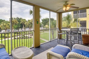 Condo Exterior | Screened Balcony | Dining Area