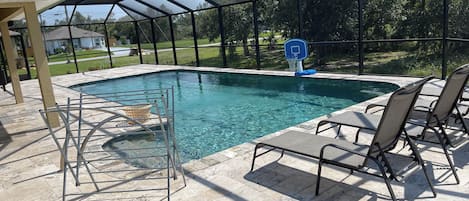 Large pool, 4 lounge chairs,  drying rack, patio table, weber grill, day bed