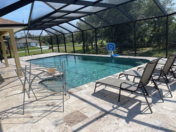 Large pool, 4 lounge chairs,  drying rack, patio table, weber grill, day bed