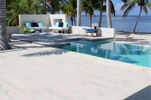 pool deck with lounge seating