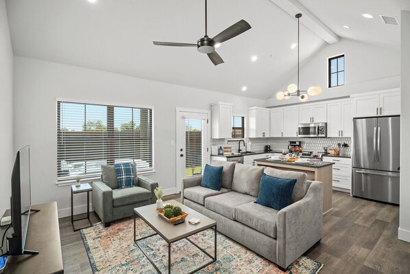 Sink into the comfy couch in the spacious living room.