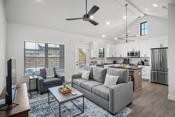 Sink into the comfy couch in the spacious living room.