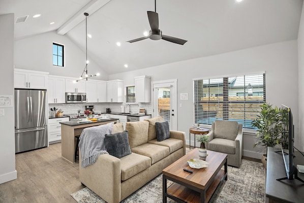 Sink into the comfy couch in the spacious living room.