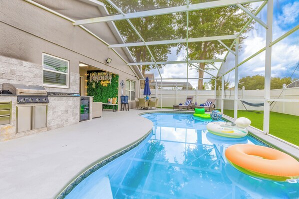 Enjoy the beautiful private pool & outdoor kitchen.