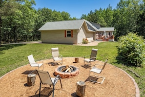 Located in the private and secluded backyard, guests must supply wood