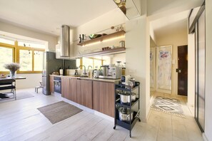 Open Living Room with kitchen front