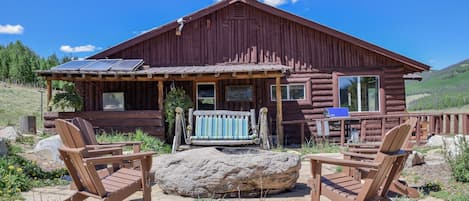 Front view with a large patio