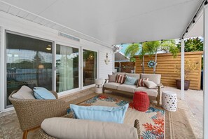 Covered Backyard Patio with Seating Area