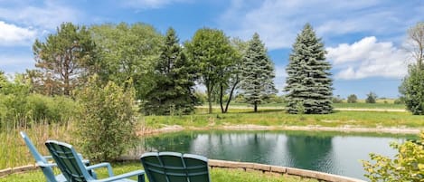 Relax and enjoy the beauty of the serene pond.