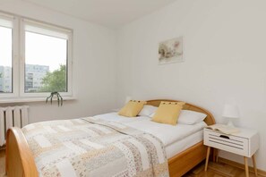 Comfortable double bed in the bedroom. 