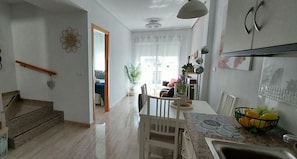 light and airy lounge, dining area..
Stairs to master, 2nd bedroom off lounge 