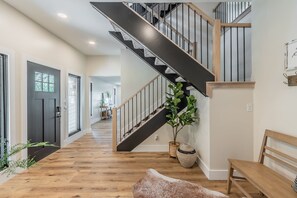 Entry area with stairs to level 2 and 3 (HVAC is controlled on levels 2 and 3)