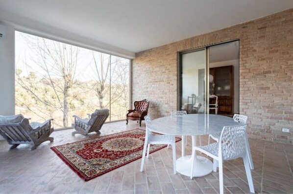 Inviting Living Room Overlooking a Serene Valley – Your Perfect Getaway!