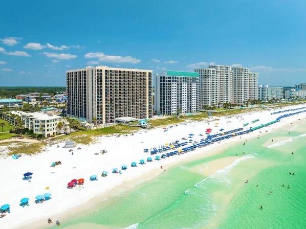 Directly from your unit, step out into a dreamscape: a pristine stretch of beach, with golden sands caressing the ebb and flow of shimmering waves. A panorama of natural beauty awaits you each day, inviting you to indulge in paradise.