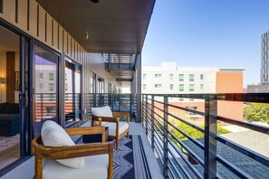 Patio off the living room complete with outdoor furniture offering a gorgeous view of Music City!