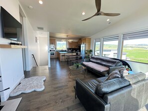 Kick back and relax in the living room, taking advantage of the cozy seating, a wood-burning fireplace and a smart TV.

(Firewood is not provided.)