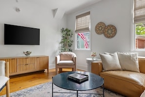Spacious living room with seating for your group