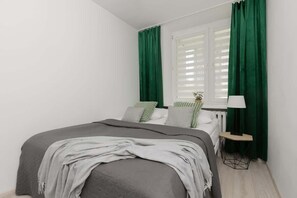 Bedroom with a comfortable double bed.