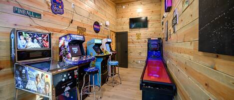 Adults and kids will love this arcade room!